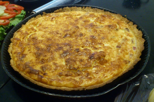 Egg, Cheese, Bacon Quiche Photo by Mandanye, CC BY-SA 4.0 <https://creativecommons.org/licenses/by-sa/4.0>, via Wikimedia Commons